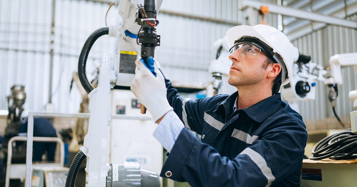 Technician working on robot